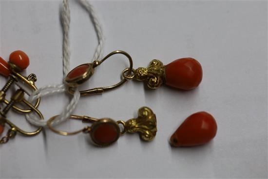 A pair of yellow metal and coral drop earrings and a similar pair of ear clips